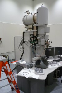 Another look at the transmission electron microscope that was moved to the SIF from the ISU campus. The main tower is where electrons are fired down and focused through apertures and lenses to the sample below, where the eyepieces are located.