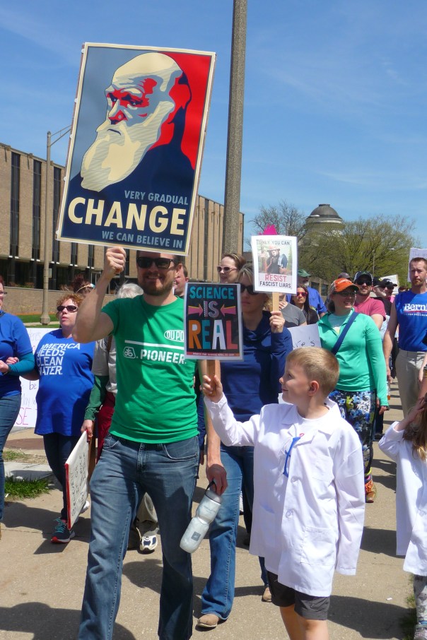 One of the better signs at last year's March for Science Iowa: A portrait of Darwin with the slogan, "Very gradual CHANGE we can believe in.". Credit: Paula Mohr.