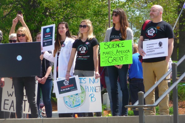 Science backers listen to speakers during the March for Science Iowa on April 22, 2017 at the Iowa State Capitol in Des Moines.