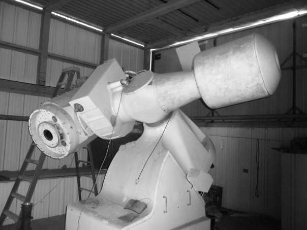The Mather Telescope at the Fick Observatory, with the reflector telescope at the left and a huge counterweight at the right.